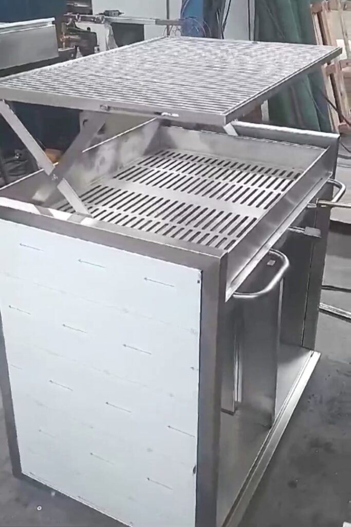barbacoa con parrilla elevable